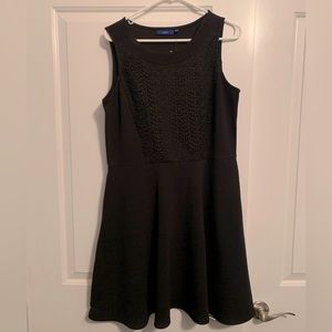 Size large, knee length black dress. Never worn.